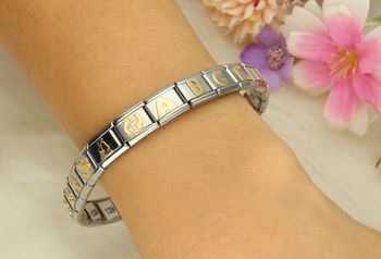 Zawieszka Nomination Link z literą A, wykonana ze stali szlachetnej i pokryta 18-karatowym złotem. Idealny element do komponowanej bransoletki Nomination Italy (2).jpg